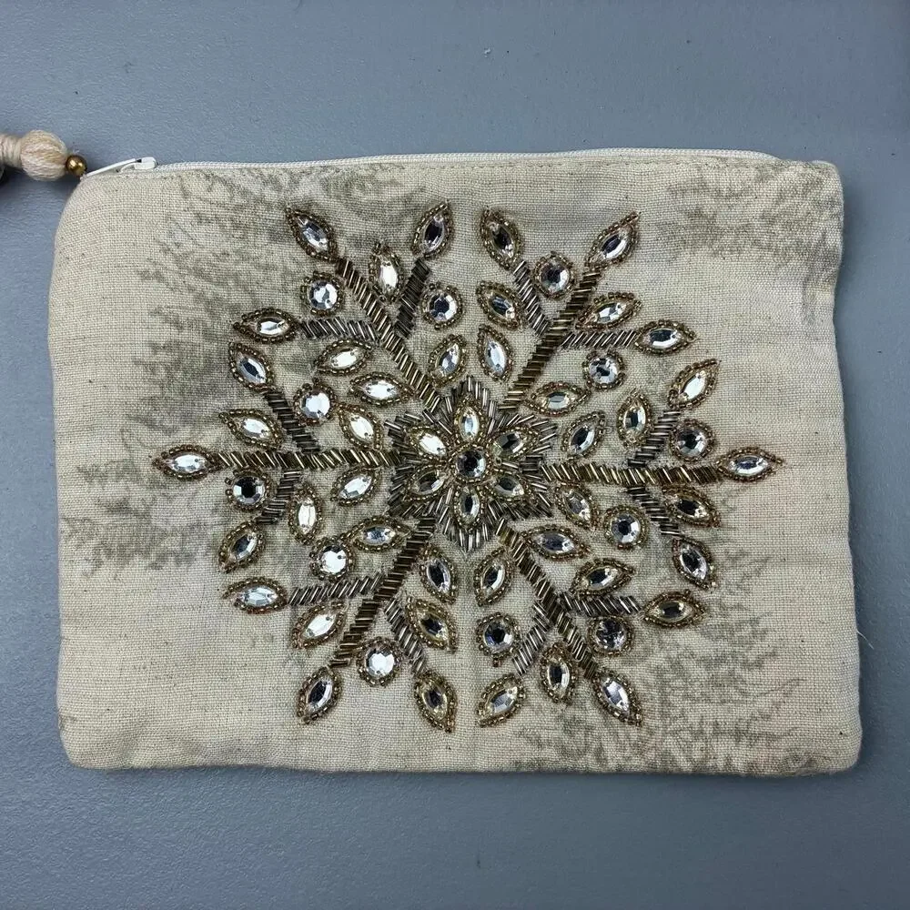 Embellished Beige Cosmetic Bag with Tassel and Zipper Closure